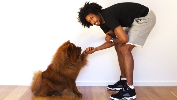 Together again: Basketballer Josh Childress and his beloved Beast.