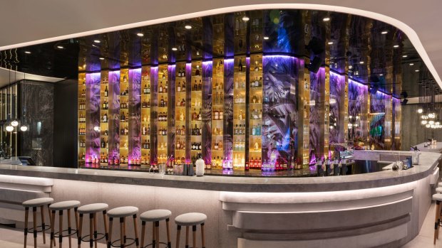 Benchtops and bar fronts at W Hotel Brisbane are inspired by the shapes of nearby clifftops.