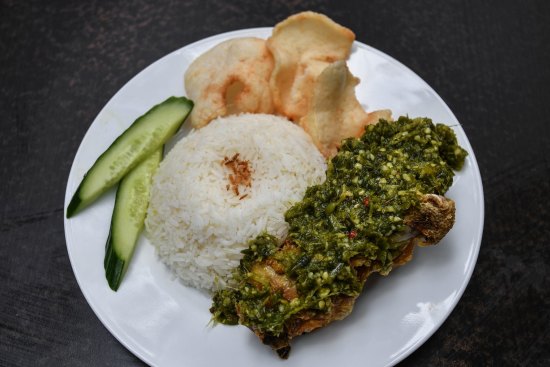 Ayam cabe ijo - fried chicken with spicy green chilli relish.
