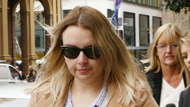 Glen McNamara's daughter Jessica leaves court after her father was found guilty of murder.
