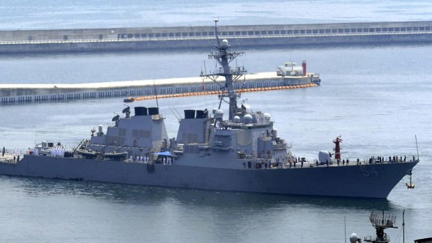 The USS Curtis Wilbur deliberately sailed near one of the Beijing-controlled islands in the hotly contested South China Sea. 