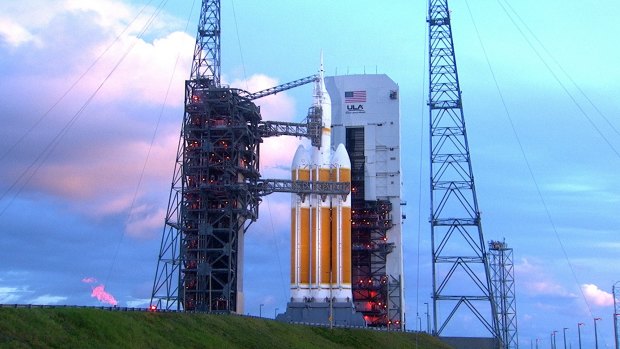 Delayed until Friday: The Orion sits atop a Delta IV Heavy rocket at Cape Canaveral Air Force Station's Space Launch Complex Flight Test in Florida.