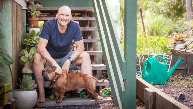 Chef Matt Golinski at his Noosa Hinterland home with his dog Duke.