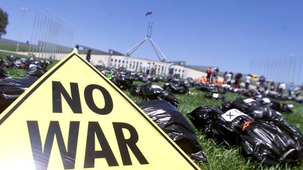 Protests against the Iraq war at Parliament House in Canberra in December 2002.
