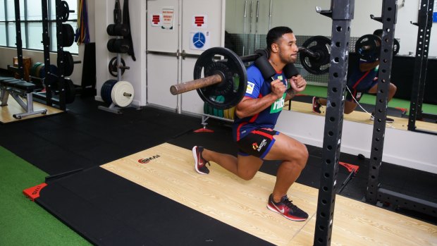 Back in action: Newcastle Knights recruit Tautau Moga working hard in the gym.
