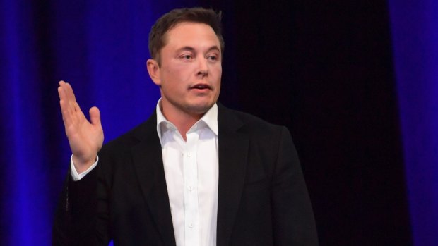 Tesla CEO Elon Musk is seen delivering a presentation at the International Astronautical Congress in Adelaide.