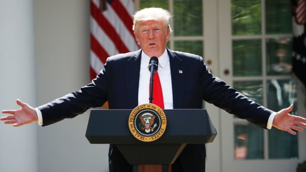 President Donald Trump announcing the US withdrawal from the Paris climate change accord.