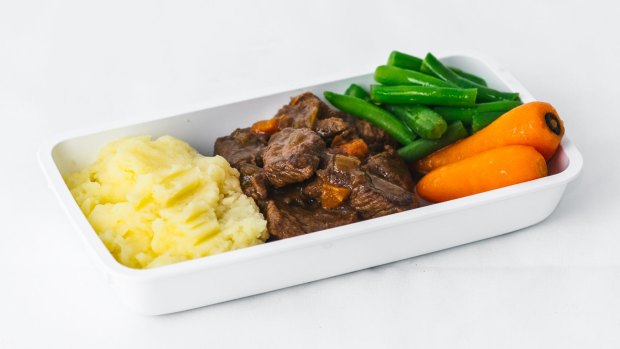 Cooper's Pale Ale braised Black Angus beef, seasonal vegetables and garlic mash, served on premium and economy class flights.