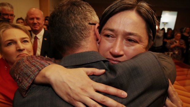 Senator Penny Wong hugs Senator Richard Di Natale after the result in the same sex marriage survey at Parliament House.