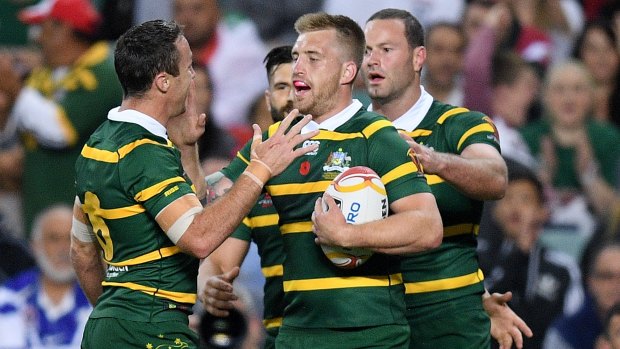 Outstanding: Playmaker Cameron Munster (centre) was in top form against Lebanon on Saturday.