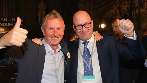 Paul Nuttal MEP (right) and Nigel Evans MP of Vote Leave celebrate as positive results come in from the counts before the official referendum announcement.