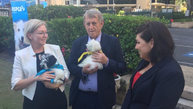 Leanne Donaldson, Jim Pearce and Leeanne Enoch meet some furry friends on the day laws were introduced to stop puppy farms.