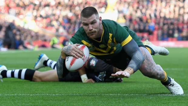 Josh Dugan scores Australia's second try against New Zealand at Anfield on Sunday.