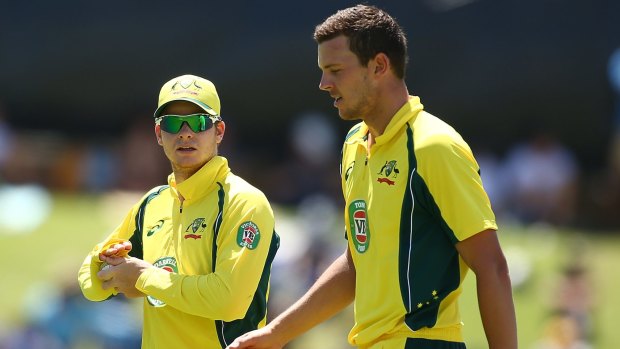Skipper Steven Smith revs up bowlerJosh Hazlewood during ODI match between Australia and India at WACA last month.