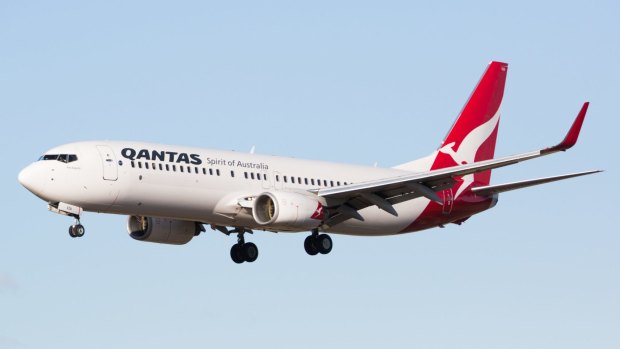 The Qantas 737 does not offer lie-flat seats in business class, but they're comfortable enough for the daytime flight.