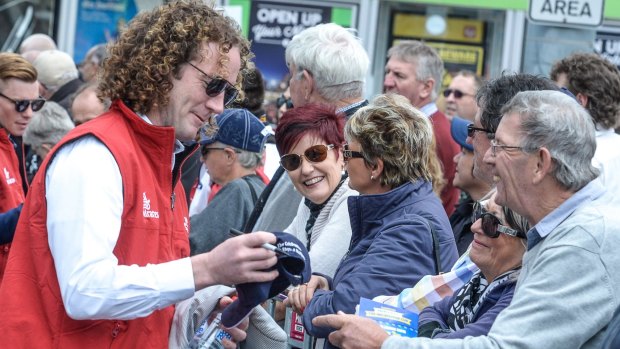 Possible casualty: Jameka trainer Ciaron Maher signs autographs.