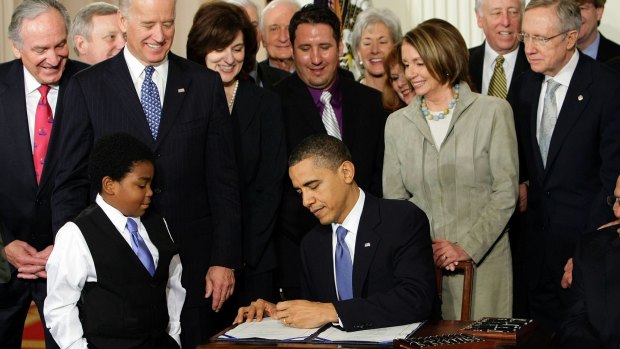 President Barack Obama signs the Patient Protection and Affordable Care Act in  March 2010.