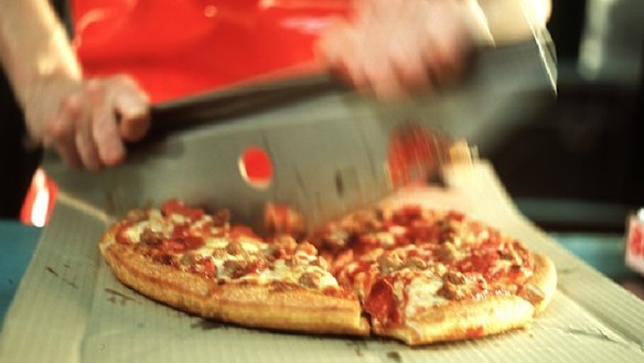 The introduction of $4.95 pizzas by Domino's cut into Pizza Hut and Eagle Boys.