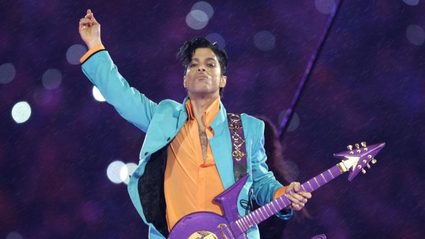 Prince performs at the Super Bowl halftime show in 2007.