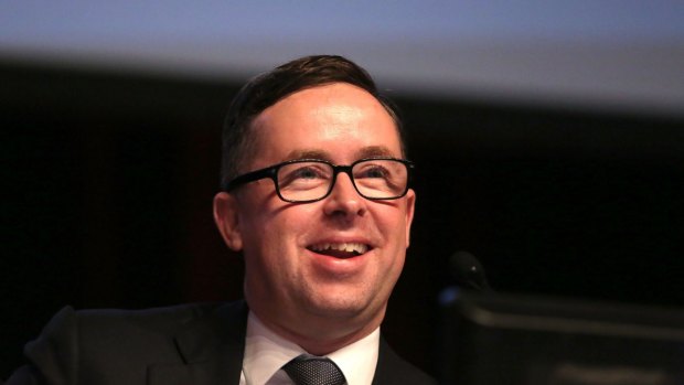 Qantas chief executive Alan Joyce has reason to smile as he says all businesses of the flag carrier performed strongly in the first half of the financial year. 
