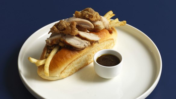 Levi's roast chicken roll is stuffed with house-made stuffing, chips, mayo and fried chicken skin.