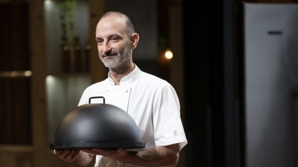 Andreas Papadakis the king of pasta and his cloche.