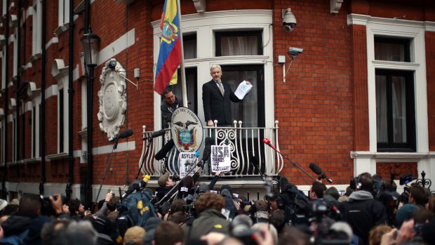 Julian Assange speaks from the balcony of Ecuador's London embassy following the release in February of a United Nations report on his situation.