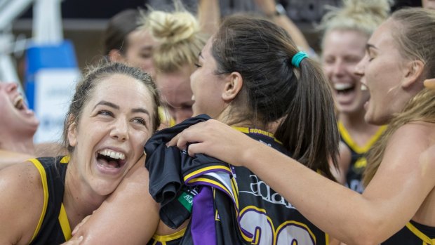Melbourne Boomers celebrate their game-two win over Townsville Fire that has set up a decider in Townsville on Sunday. 