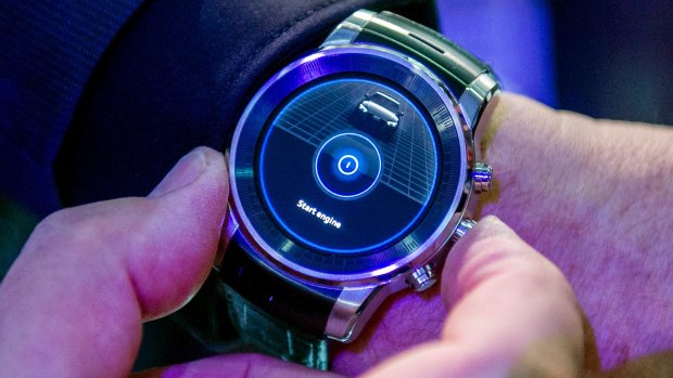 The yet-to-be-named smartwatch is demonstrated at a press conference.