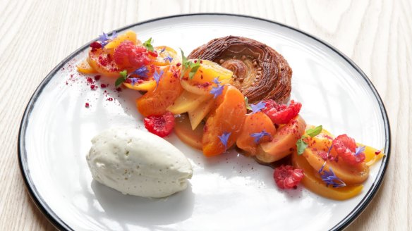 Buckwheat kouign-amann with stonefruit.