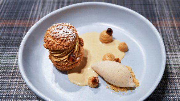 Choux pastry sandwiched with praline cream and served with praline ice-cream and custard.