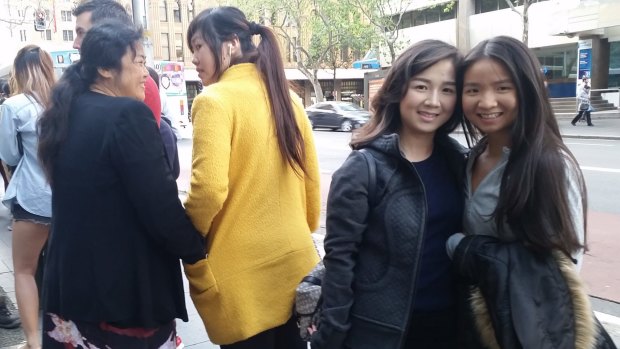 Sisters Rini and Rika, both from Waterloo, were last in the line that snaked 400 metres from the apple store.