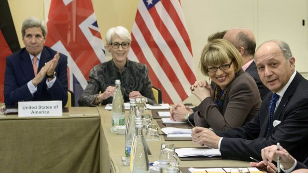 US Secretary of State John Kerry, left, US Under Secretary for Political Affairs Wendy Sherman (second left) and French Foreign Minister Laurent Fabius (right) at the start of a meeting in Lausanne on Saturday. 
