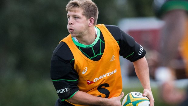 Excited: Waratahs rookie Mack Mason goes through his paces at Wallabies training. 