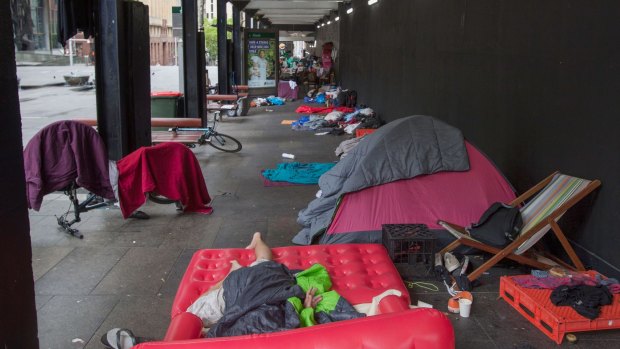 Homeless people sleeping at the top of Martin Place earlier this year.