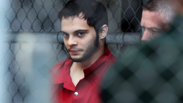Esteban Santiago is taken from the Broward County main jail as he is transported to the federal courthouse in Fort Lauderdale.
