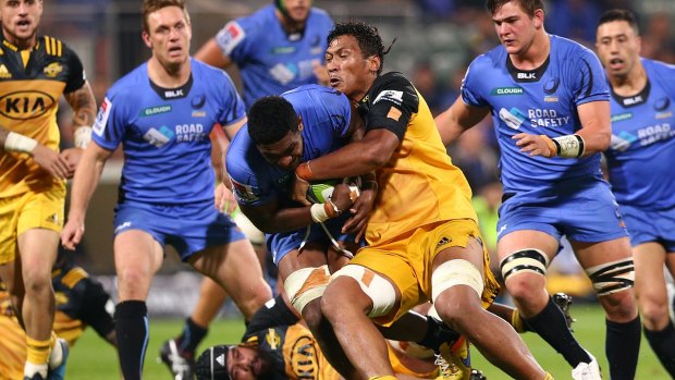 Battling on: Western Force made inroads into the opposition 22, but were unable to convert as the Hurricanes scored four tries in the final third of the match.