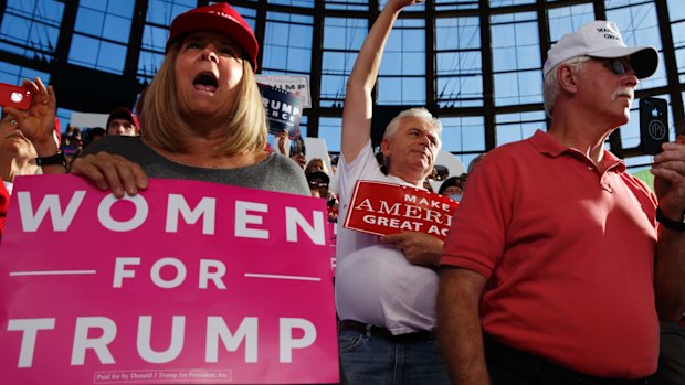 The last stand: supporters of Republican presidential candidate Donald Trump cheer on their man in Raleigh.