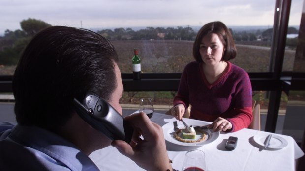 Mobile phones have been ruining special occasion meals for decades. 