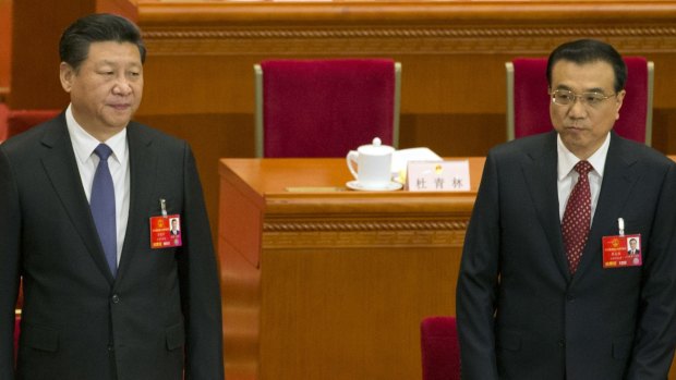 Chinese President Xi Jinping, left and Chinese Premier Li Keqiang at the annual National People's Congress on Saturday. 