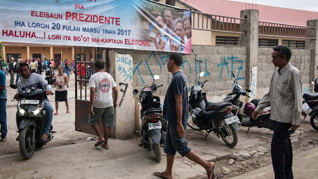 Voters enter a polling booth in Dili, East Timor, on Monday.