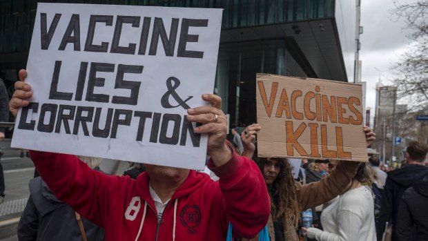Anti-vaccination protesters rally outside the Medical Board of Australia.