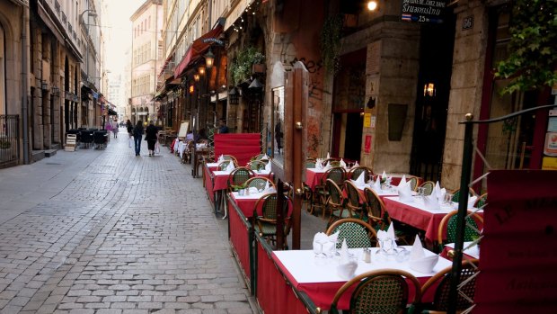 Traditional restaurants in Lyon, France called Bouchon Lyonnais, which serve typical regional dishes. 