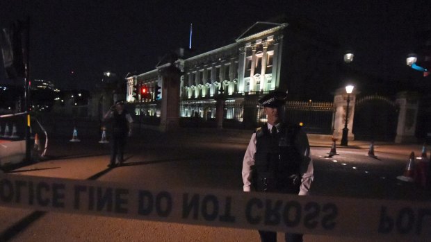 A police cordon outside Buckingham Palace where a man has been arrested after an incident, in London.