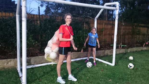 Alexandra Bradley, 16, coaches an under-11 girls football team.