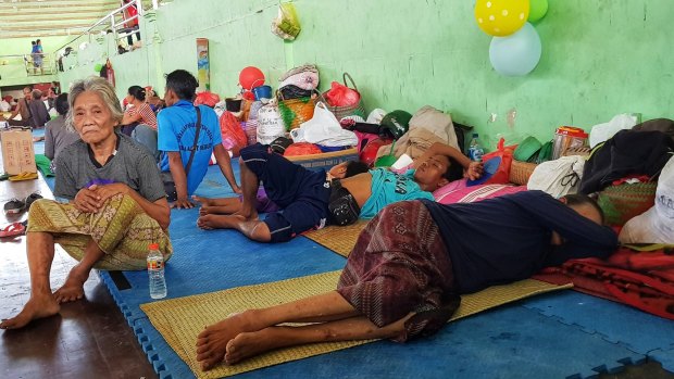 People rest at an evacuation centre in Klungkung, Bali, after leaving their homes and belongings behind. 