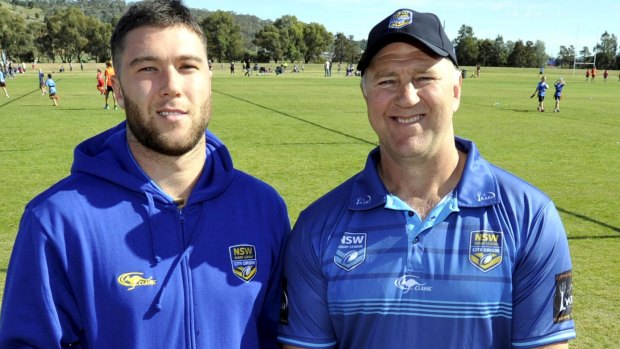 Famous football family: Curtis Sironen and his dad Paul in City Origin camp ahead of today's match against Country.
