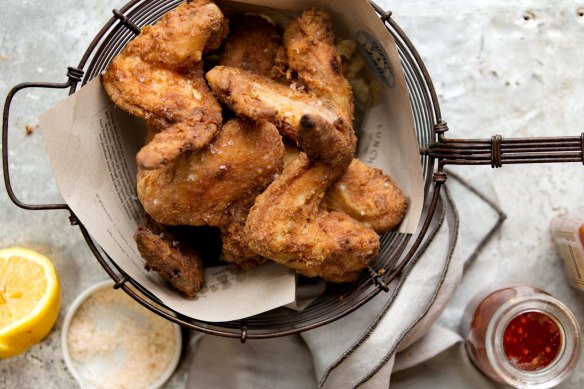 Buttermilk fried chicken with hot sauce.