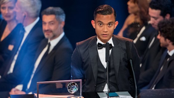Faiz Subri collects his FIFA Puskas Award in Zurich.