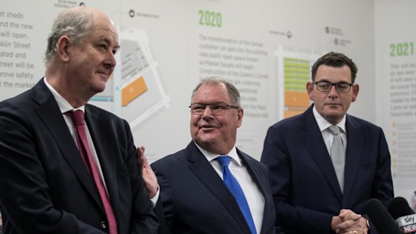 Lord Mayor Robert Doyle flanked by Planning Minister Richard Wynne (left) and Premier Daniel Andrews (right) at the market last month. 